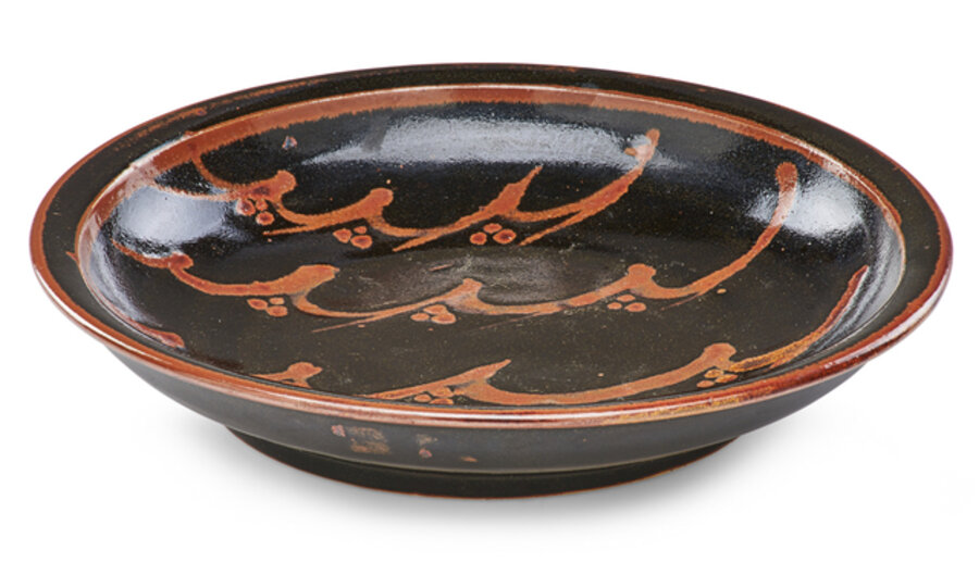 Low bowl, kaki over tenmoku glaze, England