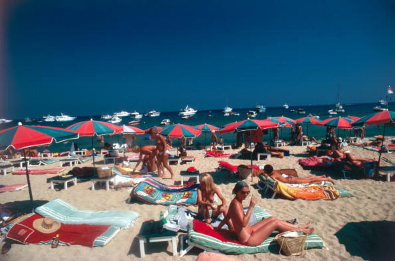Slim Aarons, ‘Beach At St. Tropez: Sunbathers on the beach at St. Tropez, France’, 1977, Photography, C-Print, Staley-Wise Gallery