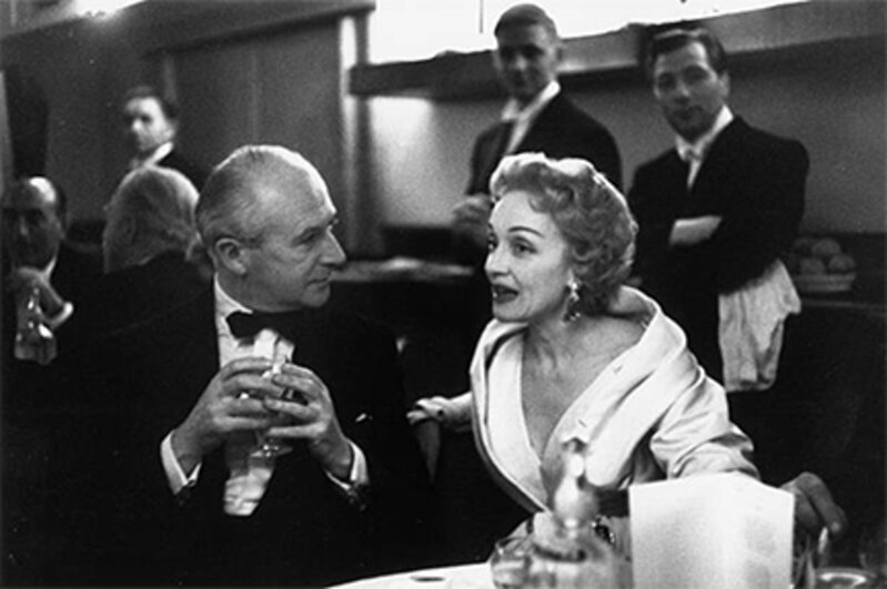 Slim Aarons, ‘I'm Listening, May 1955: Cecil Beaton and Marlene Dietrich at Lord Camrose's Election Day party, The Savoy’, Photography, Gelatin Silver Print, Staley-Wise Gallery