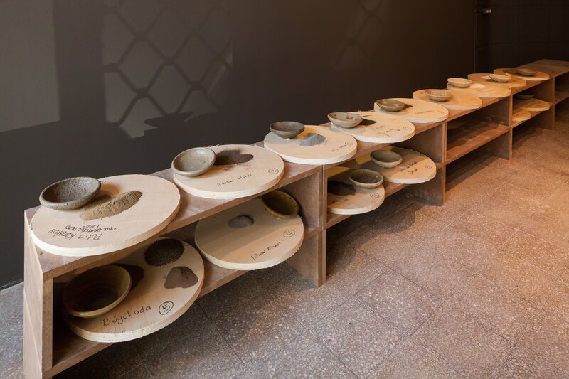 Theaster Gates, ‘Three or Four Shades of Blues’, 2015, Installation, 17th-century Iznik plate, wheels, wedging tables, clay, single-channel video, Atlantic records, books, Istanbul Biennial 