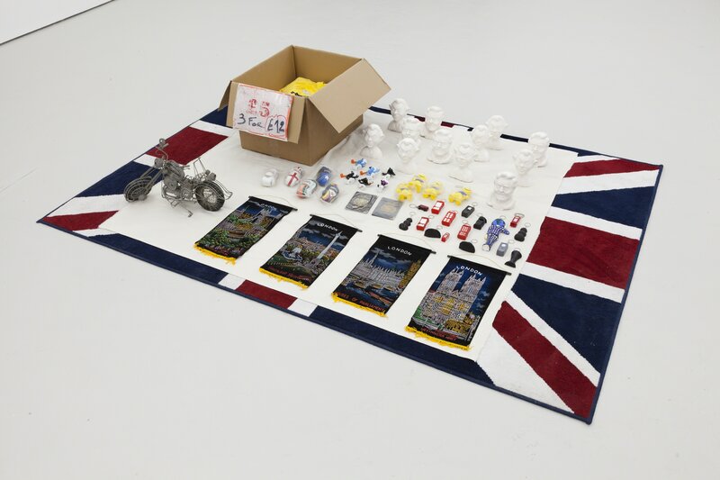 Lloyd Corporation, ‘A Search for Lost Causes and Impractical Aims (The petty needs of the average American)’, 2016, Other, Carpet, canvas, plaster, resin, key chains, stress balls, miniature boxing gloves, t-shirts, cardboard, passport wallets, steel wire handicraft motorbike, Smurf models, airfix paint, souvenir flags, CARLOS/ISHIKAWA