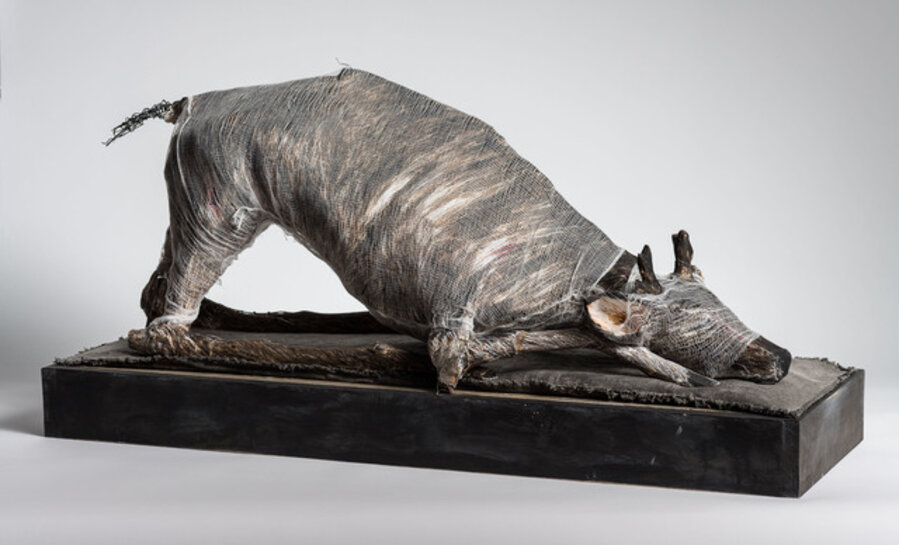 Animal in play position, sculpture: 'Prepare Thyself to Follow Me'