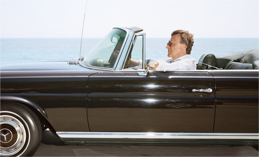 Man cruising south-southeast at 65 mph on Highway 101 near Toro Canyon on June 19th as the tide is coming in, 2010