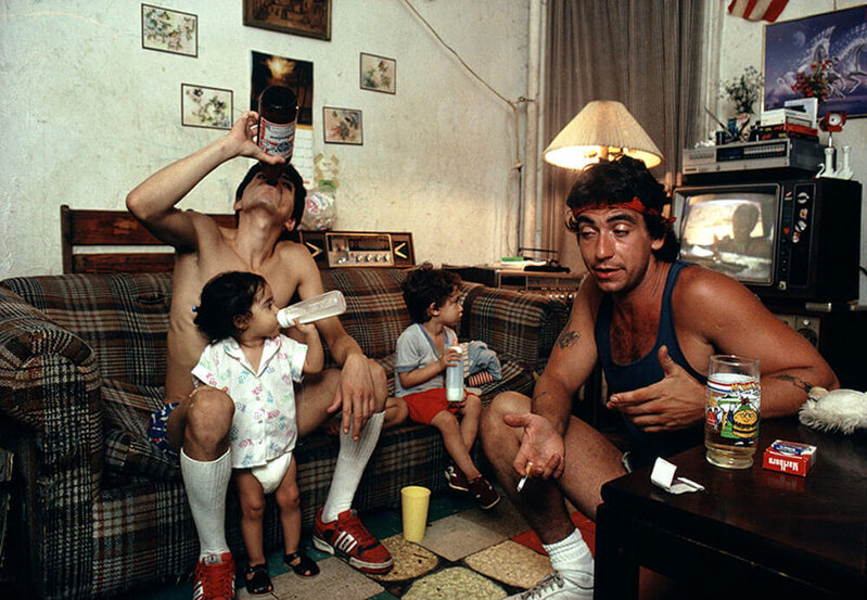 Joseph Rodriguez, ‘Peter drinks a beer with a friend as his children watch TV, Spanish Harlem, NY’, 1987, Photography, Cibachrome print, Galerie Bene Taschen