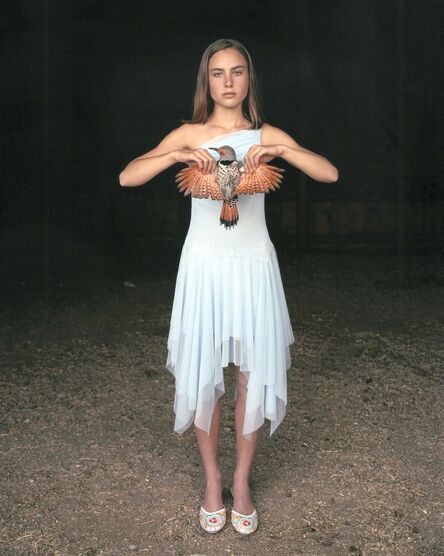 Laura McPhee, ‘Mattie with a Northern Red-Shafted Flicker, in her Eighth Grade Graduation Dress, March 2005, Laverty Ranch, Idaho 5/5’