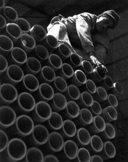 Leo Matiz, ‘Untitled - Man on Pipes’, 1940s