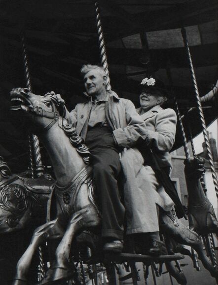 Izis, ‘A Couple on Carousel during August Bank Holiday Fair, London’, 1952/1952