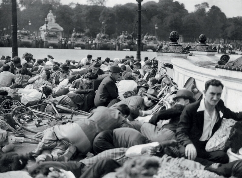 AFP, ‘On August 26th, 1944, Parisians take cover from sporadic shooting during General Charles de Gaulle’s parade on the Place de la Concorde to celebrate the Liberation of Paris.’, 1944, Photography, Digital silver print on baryta paper, DIGARD AUCTION