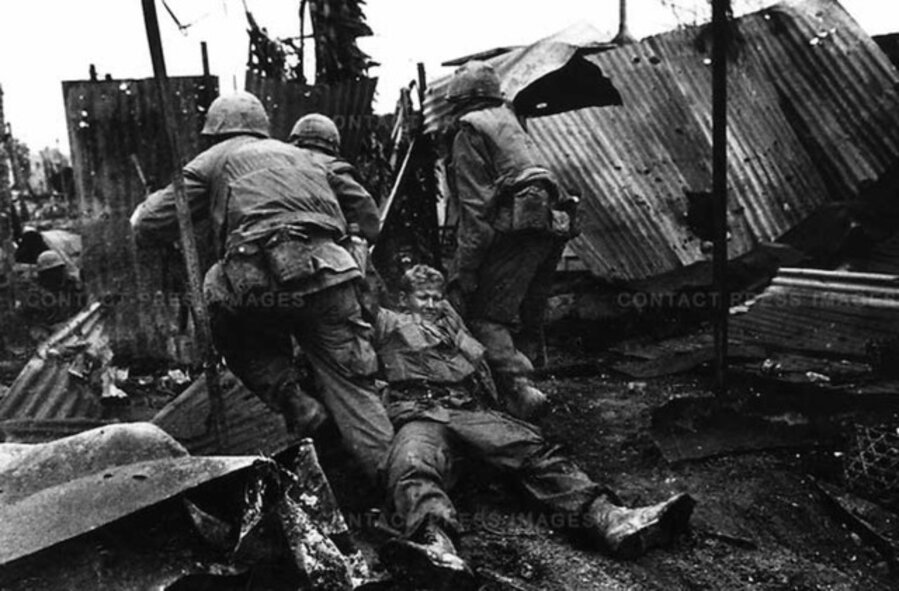 U.S. Marines drag a wounded comrade, Têt offensive, Battle of Hué