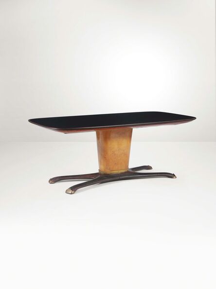 ‘A table with a wooden structure, glass top and brass details’, 1950 ca.