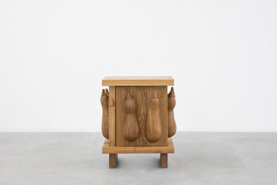 Oak cabinet with courgettes and nose
