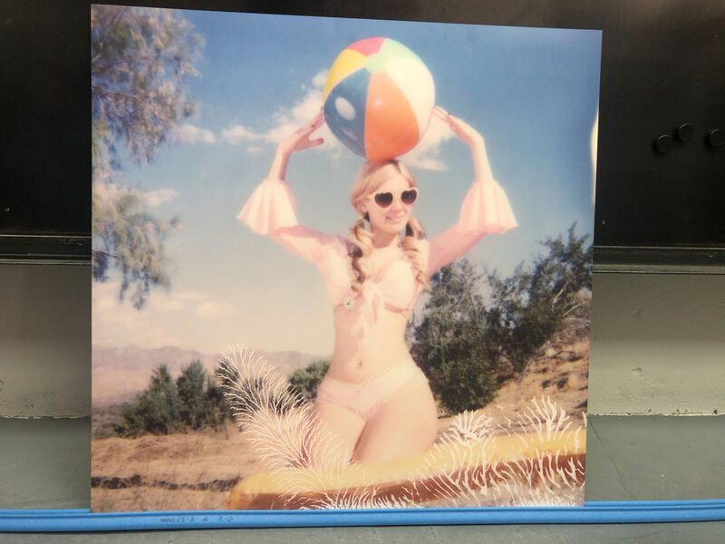 Stefanie Schneider, ‘Moneypenny with Beach Ball' (Heavenly Falls)’, 2016, Photography, Digital C-Print based on a Polaroid, mounted on Dibond with matte UV-Protection., Instantdreams
