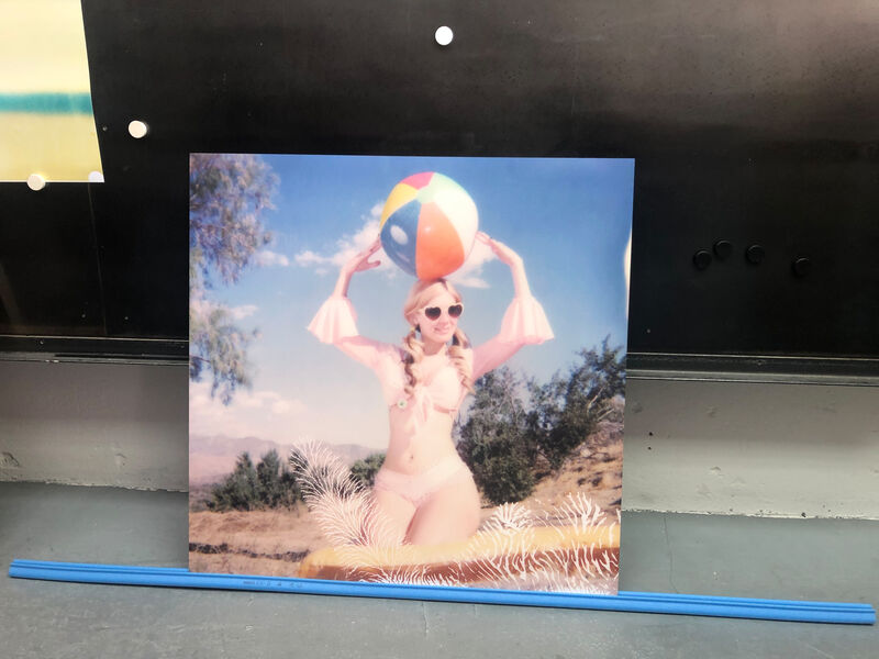 Stefanie Schneider, ‘Moneypenny with Beach Ball' (Heavenly Falls)’, 2016, Photography, Digital C-Print based on a Polaroid, mounted on Dibond with matte UV-Protection., Instantdreams