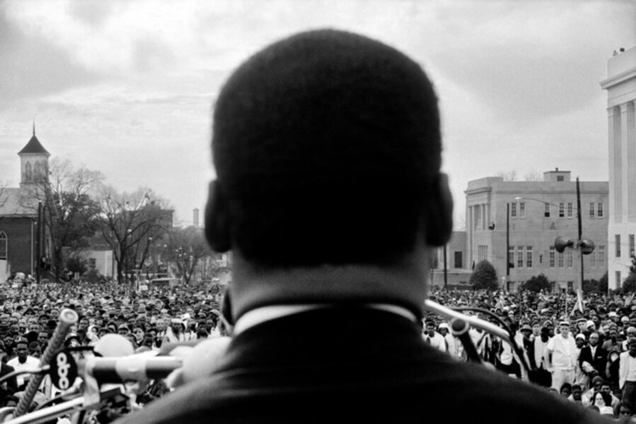 Dr. Martin Luther King Jr. speaking to 25,000 civil rights marchers at end of Selma to Montgomery, Alabama march, March 25