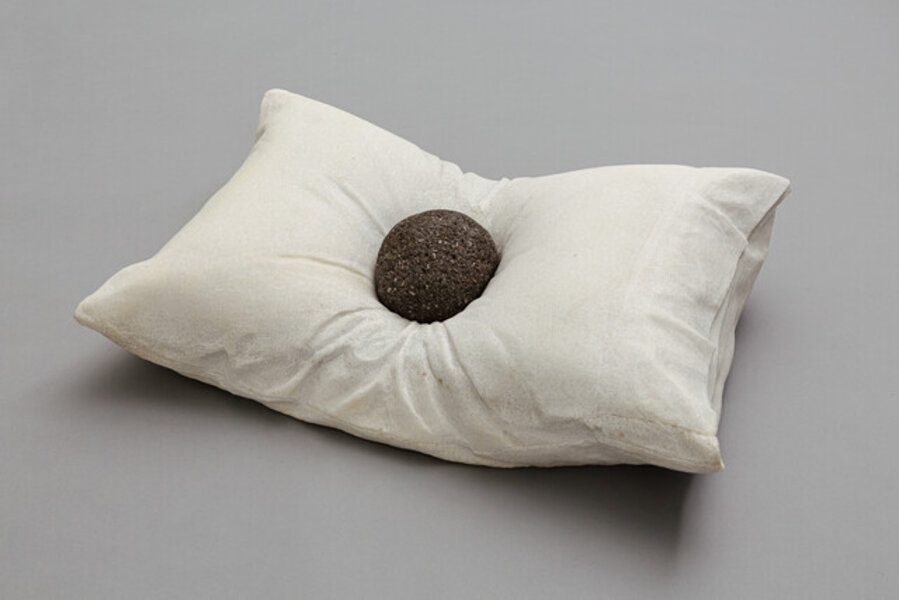 A Pillow with a River Rock