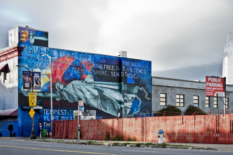 “Lady Liberty Reclining” mural on building wall, at 4th and Welsh Streets