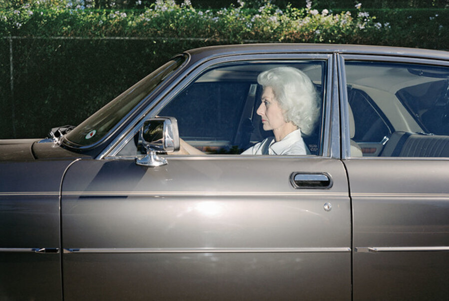 Woman caught in traffic while heading southwest on U.S. Route 101 near the Topanga Canyon Boulevard exit, Woodland Hills, California, at 5:30 p.m. in the summer of 1989