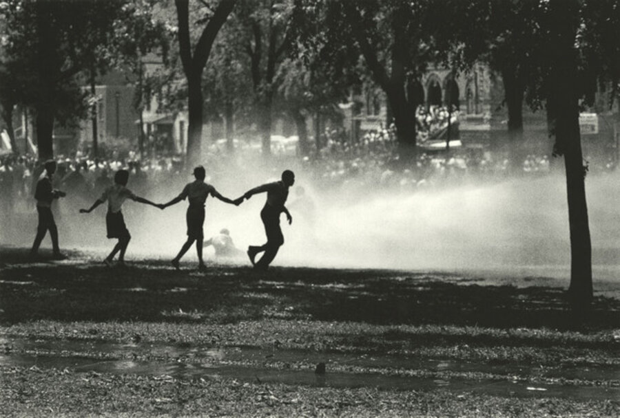 Fireman turned high powered hoses against peaceful demonstrators.