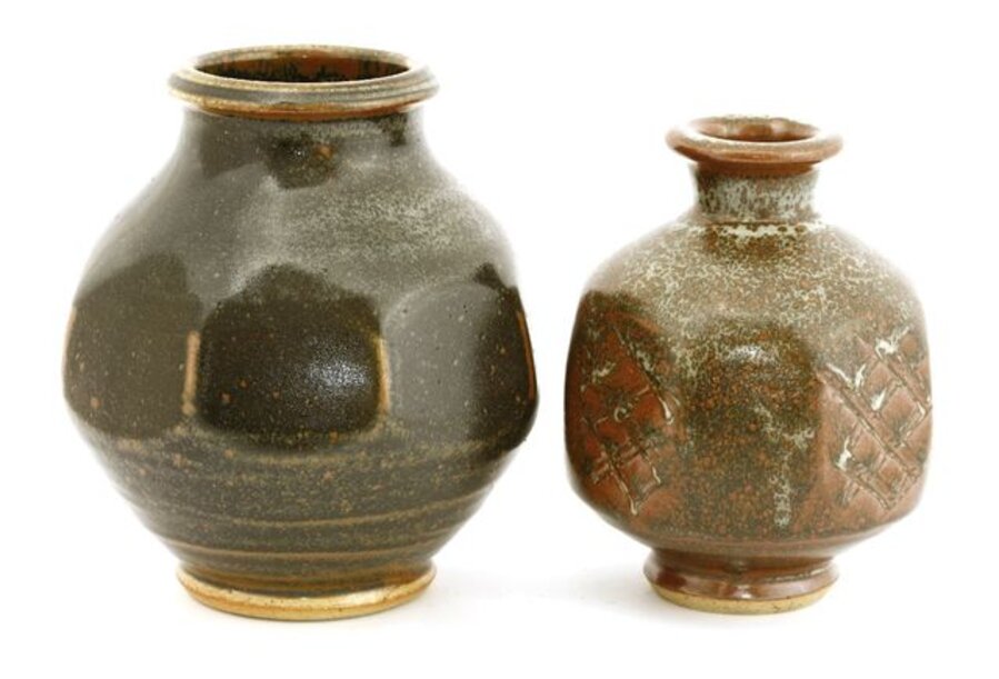 two glazed Muchelney Pottery vases, each of octagonal form, one with incised details
