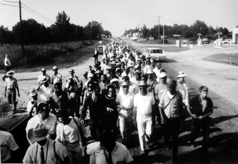 Dr. King and wife Coretta with crouds ‘March Against Fear’, Mississippi, June 1966