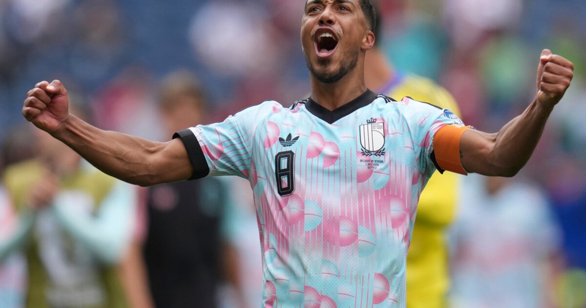 René Magritte-inspired jersey worn by Belgian soccer team during World Cup 2026 knockout match.