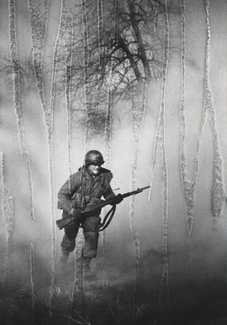 Tony Vaccaro, ‘American GI Ivan Parrott is seen running through smoke in no man’s land near Neuss, Germany during the Battle for the Rhine, World War II, 1st March 1945’