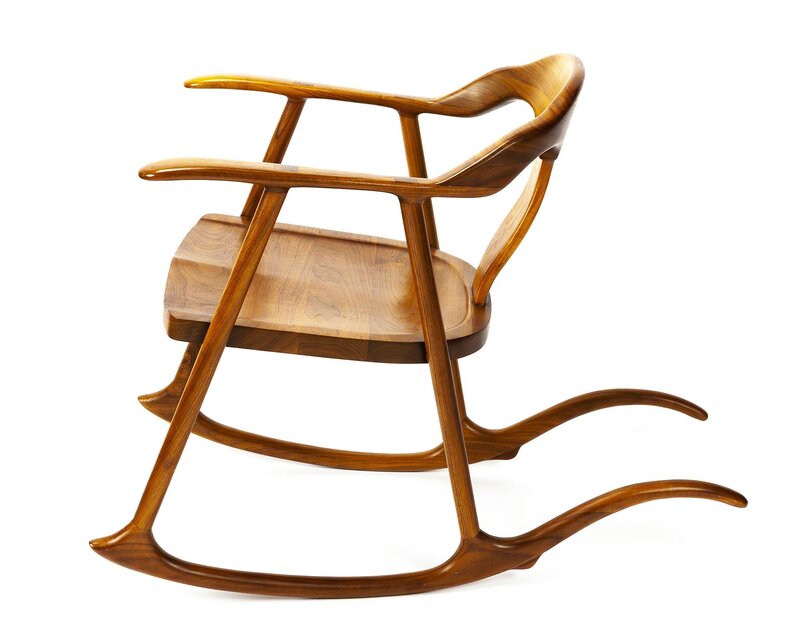 ‘A Sam Maloof-style walnut rocking chair’, Design/Decorative Art, The curved backrest over a molded seat on post supports terminating in curved rails, John Moran Auctioneers