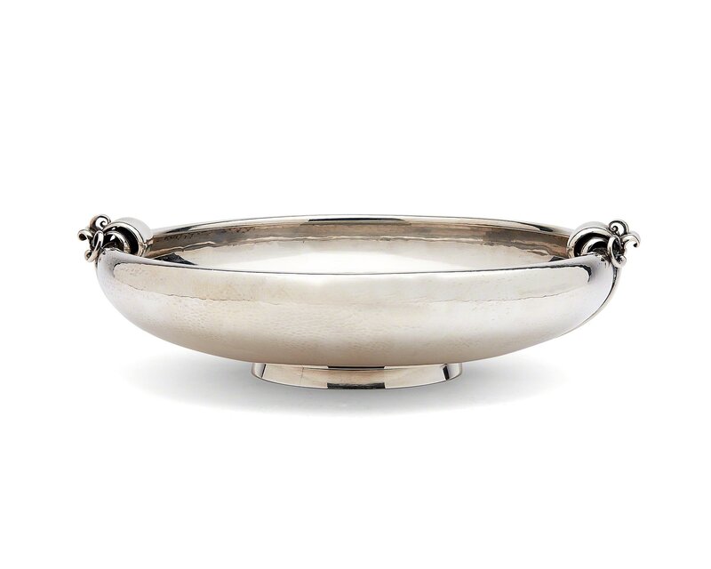 Georg Jensen, ‘A sterling silver serving bowl’, Design/Decorative Art, The hammered bowl with scrolled stylized iris handles, on ring foot, John Moran Auctioneers