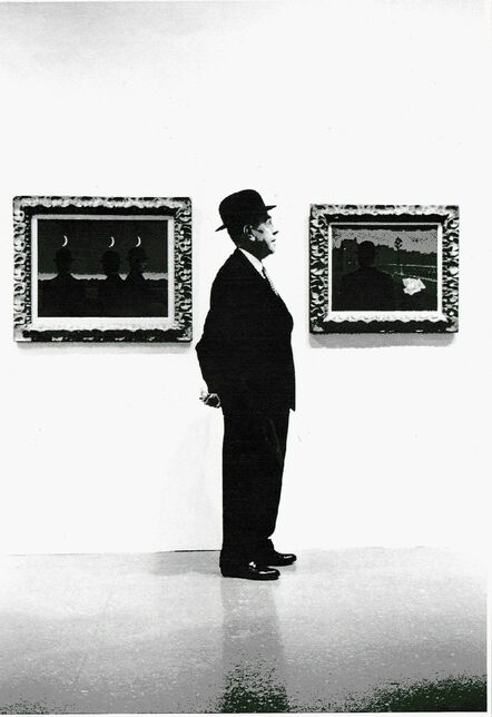 Steve Schapiro, ‘Rene Magritte standing between his paintings, Moma’, 1965
