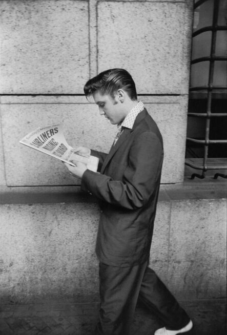 Alfred Wertheimer, ‘While Waiting for a Cab in NYC, Elvis Reads About the Airline Disaster, July 1st’, 1956
