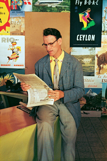 Paul Outerbridge, ‘Man at travel agency, Mexico’, ca. 1950