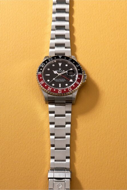 Rolex, ‘An attractive stainless steel dual time wristwatch with date, sweep center seconds, bracelet, guarantee, hang tags and box’, Circa 2000