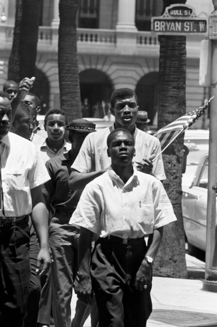 Frederick Baldwin, ‘17 year-old Benjamin Van Clark leads Beach High School students in civil rights march in Savannah, GA.’