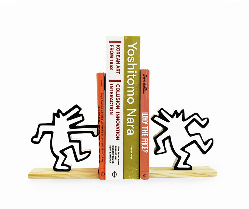 Keith Haring, ‘'Dancing Dogs' (white) Hard Wood Bookends’, 2019, Ephemera or Merchandise, Hard wood bookend set based on the artist's famous figures with non-toxic lacquer finish., Signari Gallery