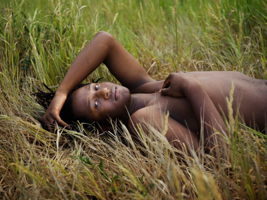 Austin lying in the grass
