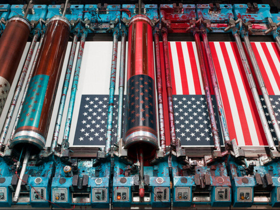 American flags in production on a rotary screen printer, Annin Flagmakers, South Boston, Virginia