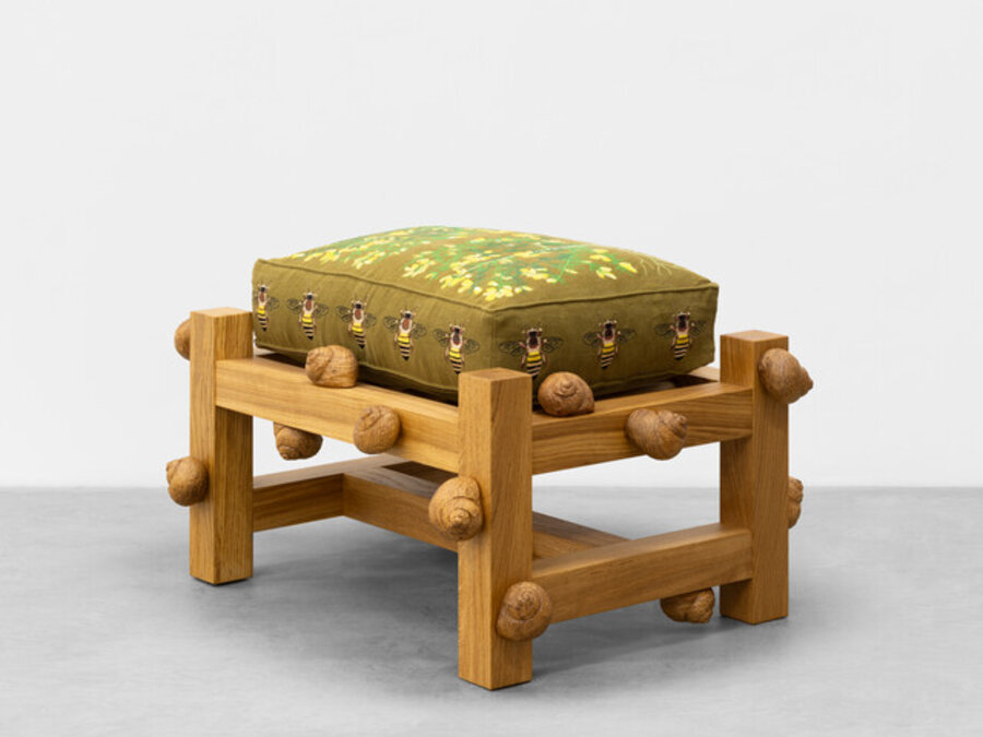 Oak bench with gorse plants, honey bees, earthworms and snails