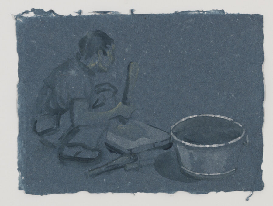 He Xiu Jun beating bark to make paper pulp