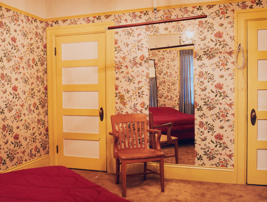 Room with flower tapestry