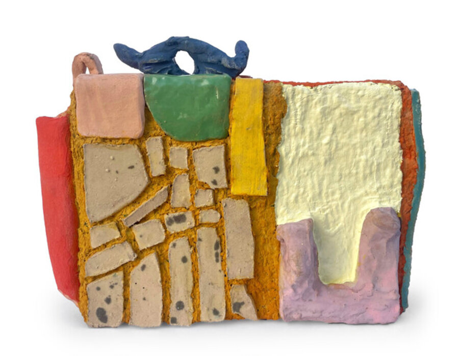 Untitled (blue horns on pink, yellow, and orange Friskies box)
