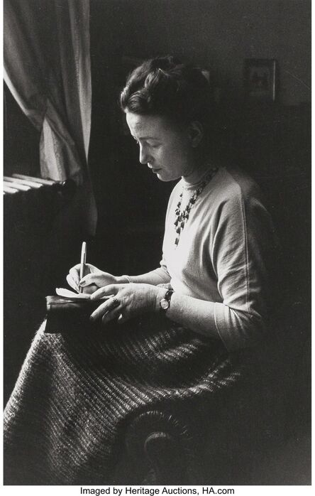 Gisele Freund, ‘Simone de Beauvoir, the day of the Prix Goncourt, next to a window writing, Paris’, 1954