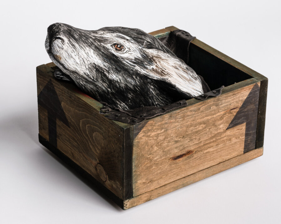 Sculpture of Deer in wood box: 'Free me from the earth'