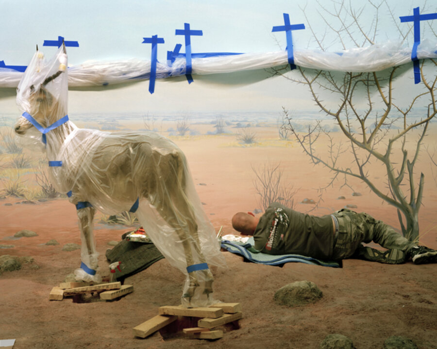 Single Ungulate and Man Amid Blue Crosses from Animal Logic