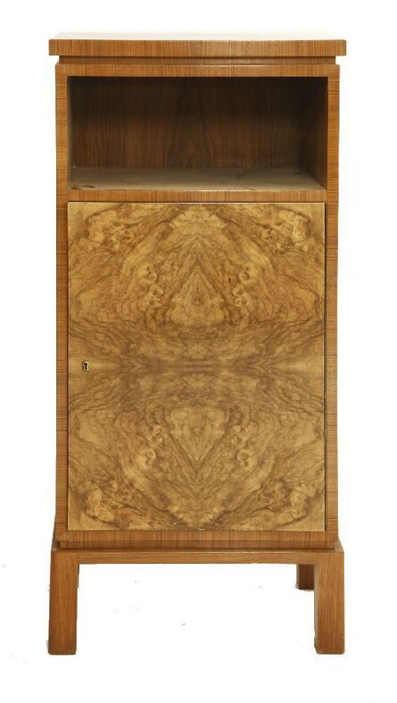 ‘An Art Deco walnut cabinet’
