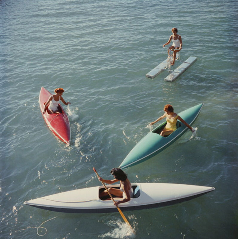 Slim Aarons, ‘Lake Tahoe Trip, 1959: Young women canoeing on the Nevada side of Lake Tahoe’, 1959, Photography, C-Print, Staley-Wise Gallery