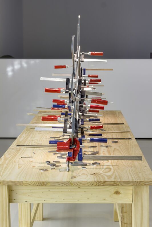 Mounir Fatmi, ‘Calligraphy of Fire, tribute to Brion Gysin’, 2012, Sculpture, Steel, clamps, wooden table, Goodman Gallery