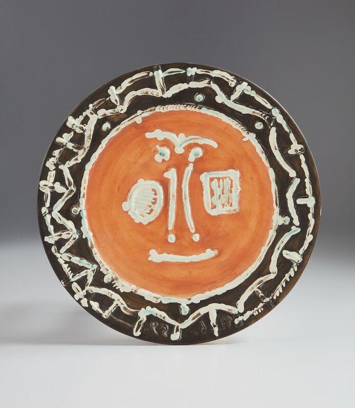 Pablo Picasso, ‘Face in thick relief (Visage en gros relief)’, 1959, Design/Decorative Art, White earthenware round dish, with decoration in engobes and pastel crayon under partial brushed glaze., Phillips