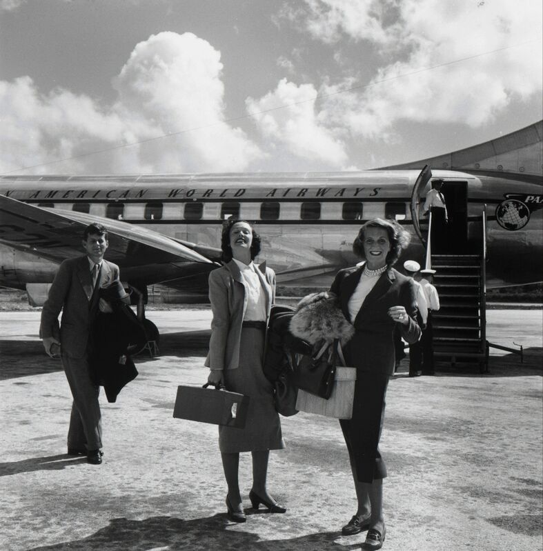 Slim Aarons, ‘John F. Kennedy with Shirley Rogan Ellis and Betty LoSavio, Montego Bay Airport, Jamaica’, 1953, Photography, Staley-Wise Gallery