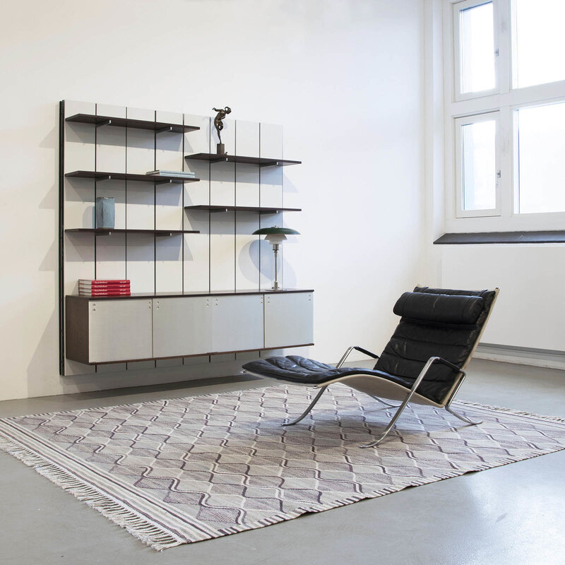 Preben Fabricius and Jørgen Kastholm, ‘Wall mounted shelving system’, 1960's, Design/Decorative Art, Black lacquered steel with wooden grey lacquered back panels, adjustable shelves and cases in wengé mounted on stainless steel brackets. Sliding doors in brushed aluminium, Dansk Møbelkunst Gallery