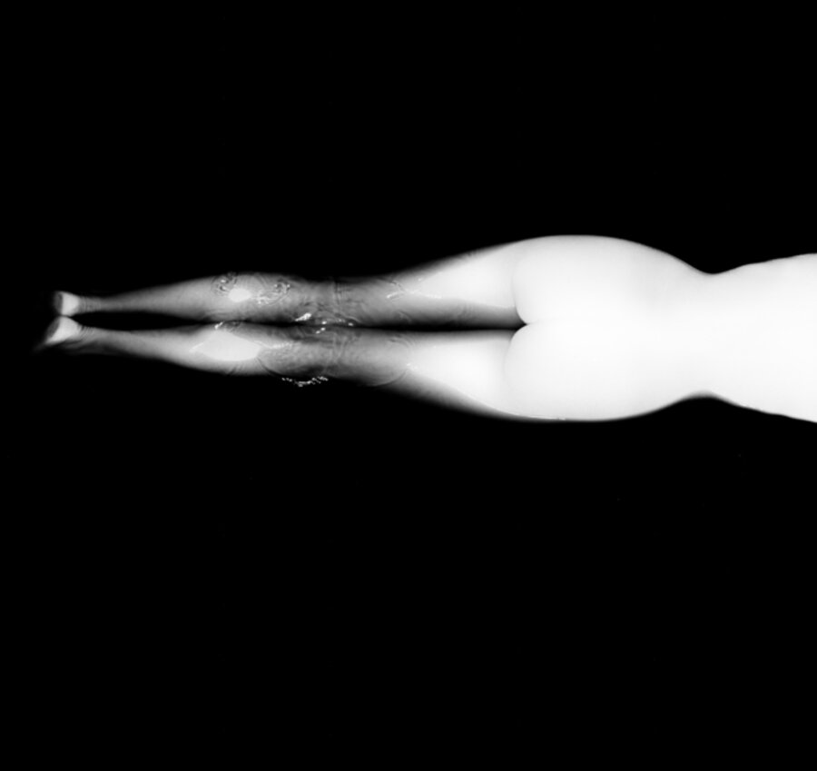 Kate swimming across river (legs only)